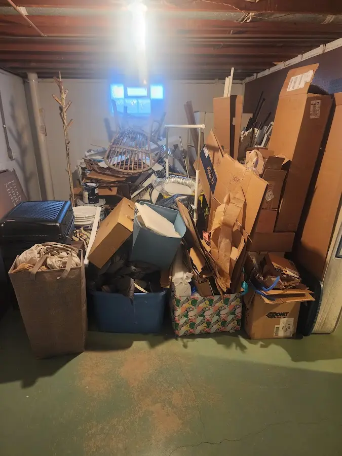 Roll-off dumpster container at job site for 4 Yard Dumpster Rental in Spokane Valley